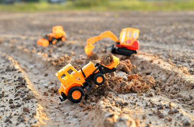 Close-up of toy car on road