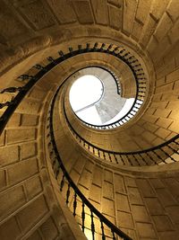 Low angle view of spiral staircase of building