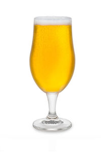 Close-up of beer glass against white background