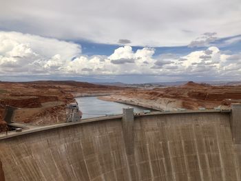 Scenic view of glen canyon dam against sky, page