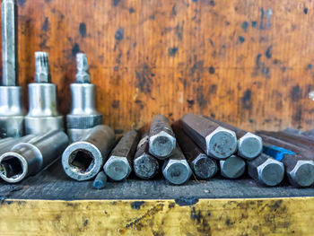 High angle view of old bottles on table