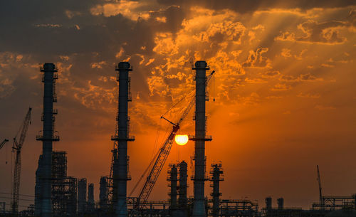 Sunrise over an oil refinery port south of kuwait city