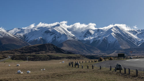 Scenic view of snowcapped mountains against sky in new zealand