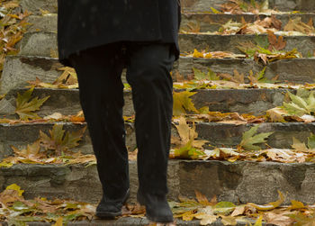 Low section of man standing outdoors