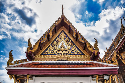 Low angle view of temple against building