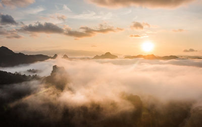 Scenic view of mountains against sky during sunset