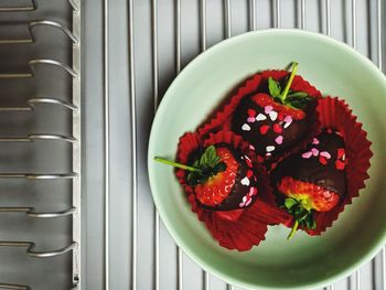 High angle view of fruits in bowl on table