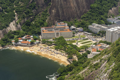 Beautiful view from sugar loaf mountain to green rainforest and beach