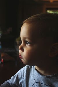 Portrait of cute boy looking away