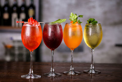 Close-up of colorful drinks on table