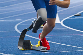 Low section of person on running track