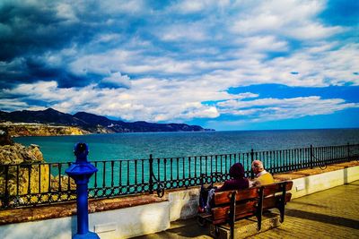 Scenic view of sea against cloudy sky