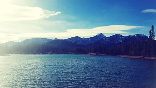 Scenic view of lake against blue sky