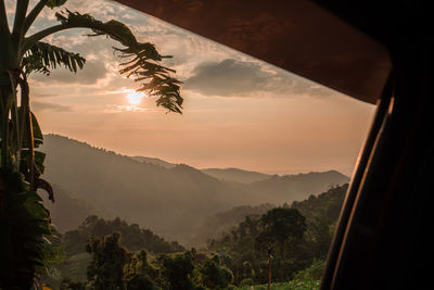 Scenic view of mountains against sky during sunset