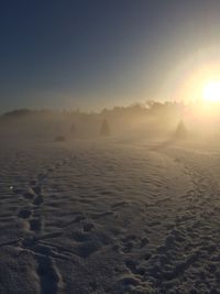 Scenic view of landscape against sky during sunset