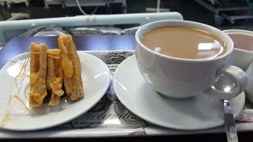 Close-up of coffee served on table