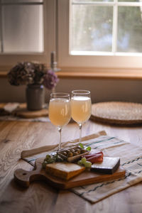 Wine glasses on table at home