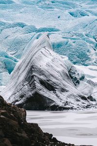 Scenic view of frozen lake against sky