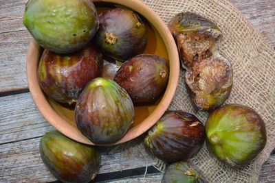 High angle view of fruits in basket on table