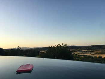 Scenic view of river against clear sky