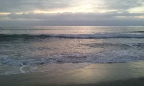 View of sea against cloudy sky