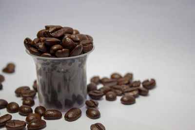 Close-up of coffee beans on table