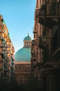 Church against sky in city