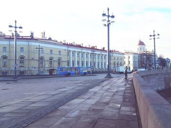 Buildings in city against sky