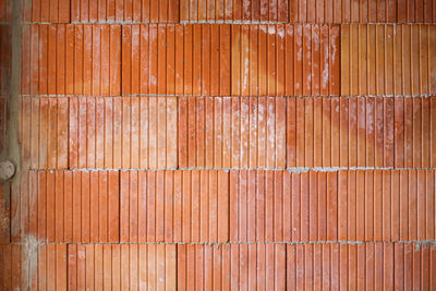 Close-up view of wall of porotherm. poroton res stone, building concept. lime stains.