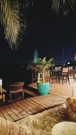 Scenic view of beach against sky at night