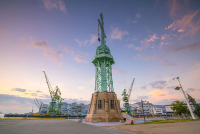 Low angle view of statue against cloudy sky