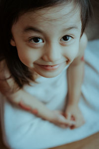 Portrait of cute girl at home