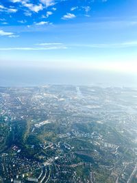 Aerial view of cityscape against sky