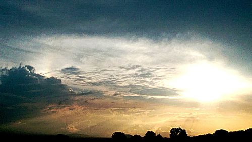 Scenic view of landscape against sky during sunset