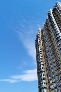 Low angle view of modern buildings against sky