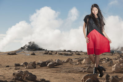 Beautiful woman posing for a fashion shoot at geothermal area