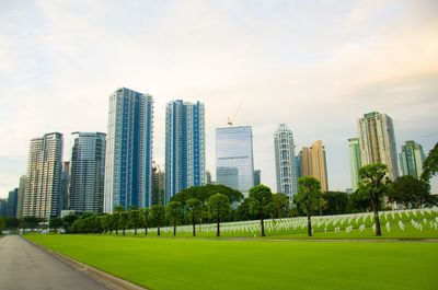 Buildings in city against sky