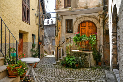 Old houses on a narrow street in maenza, a medieval village near rome in italy.