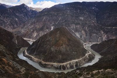 High angle shot of lake along rocky landscape