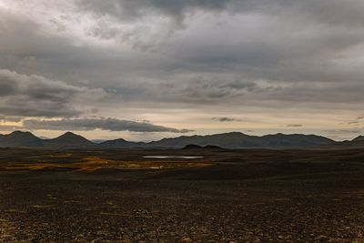 Scenic view of landscape against sky during sunset