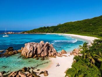 Scenic view of sea against clear blue sky