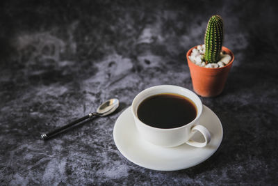 Cup of coffee on table