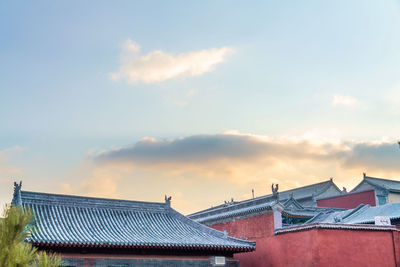 Low angle view of buildings against sky