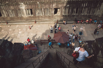 High angle view of people at a temple square