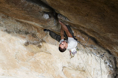 High angle view of man climbing on mountain