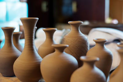 Close-up of pots at workshop