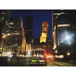 Illuminated cityscape at night