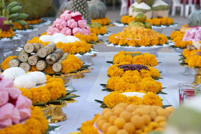 Close-up of various flowers for sale at market stall