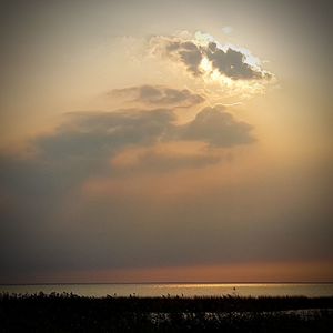 Scenic view of dramatic sky over sea