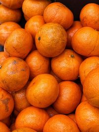 Full frame shot of oranges at market stall